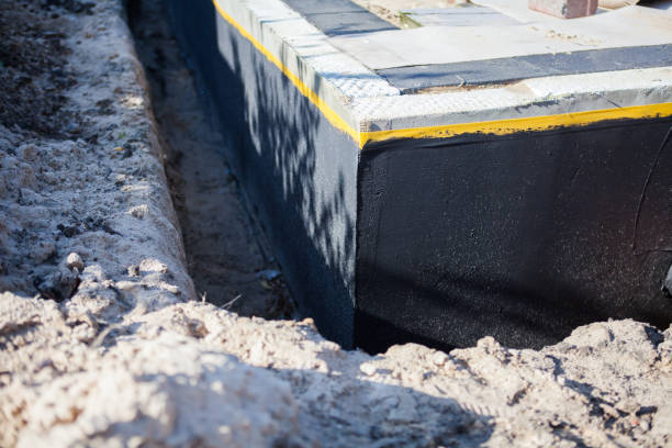 Professional Waterproofing technician working in Kennesaw, GA